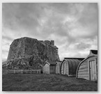 Image No : G30R1C4 : Lindisfarne Castle and boat huts